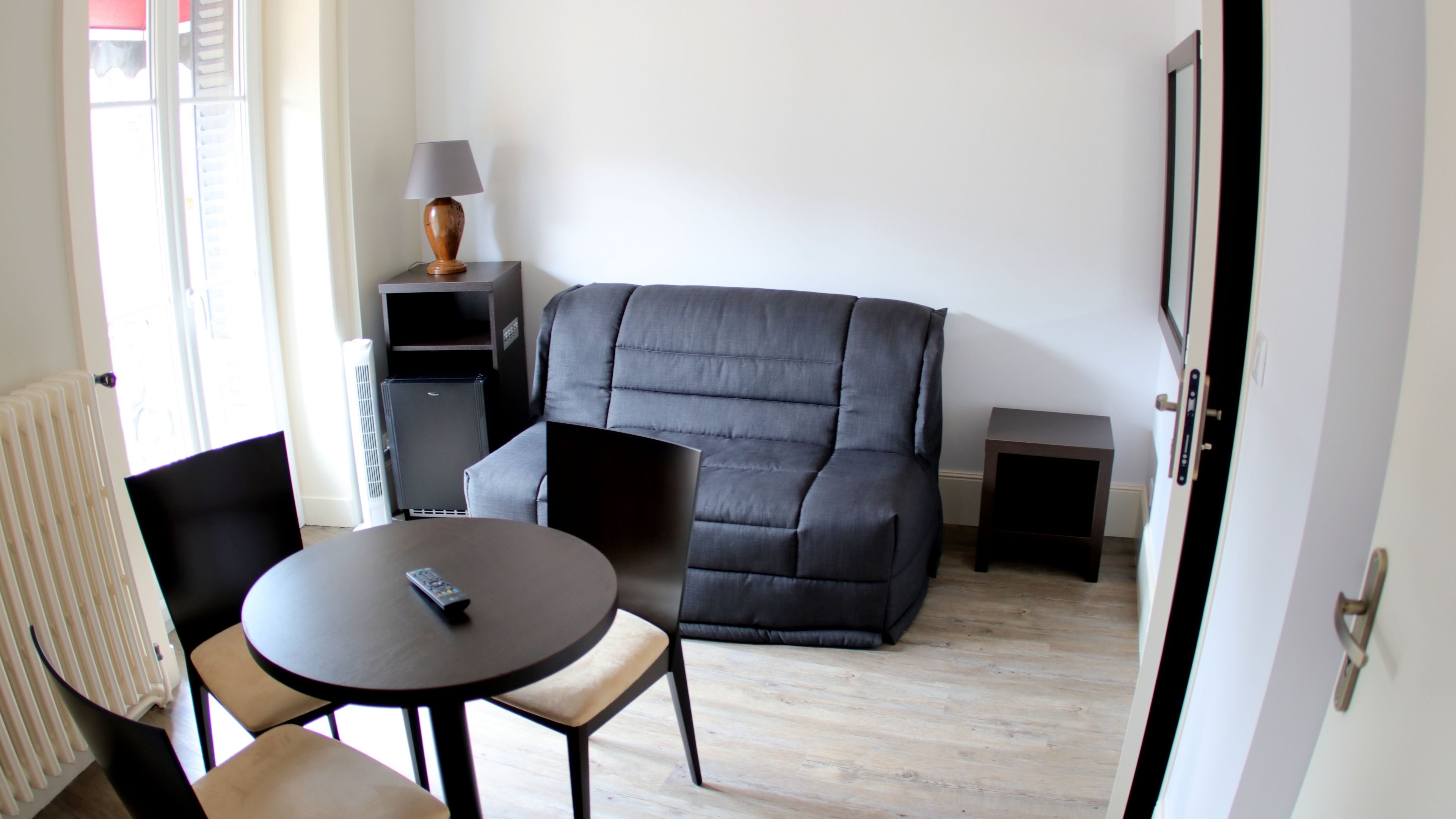 comfort double room | living area | flat-screen tv