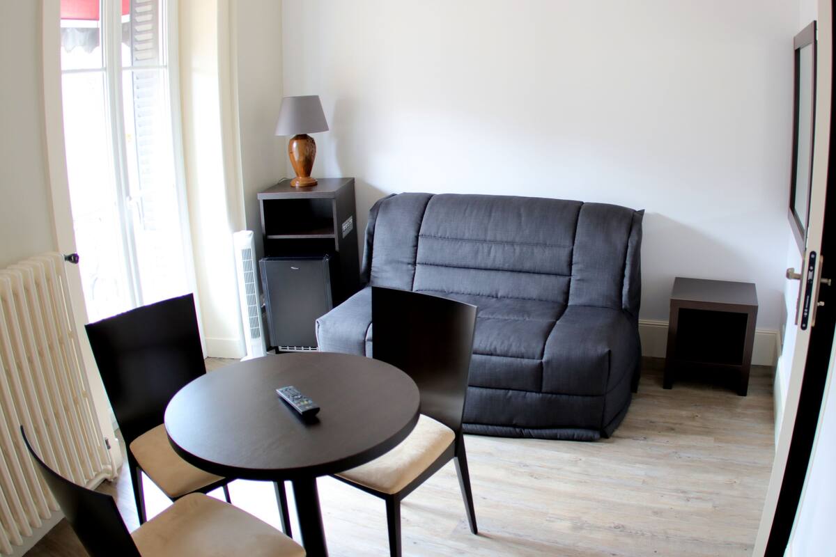 comfort double room | living area | flat-screen tv