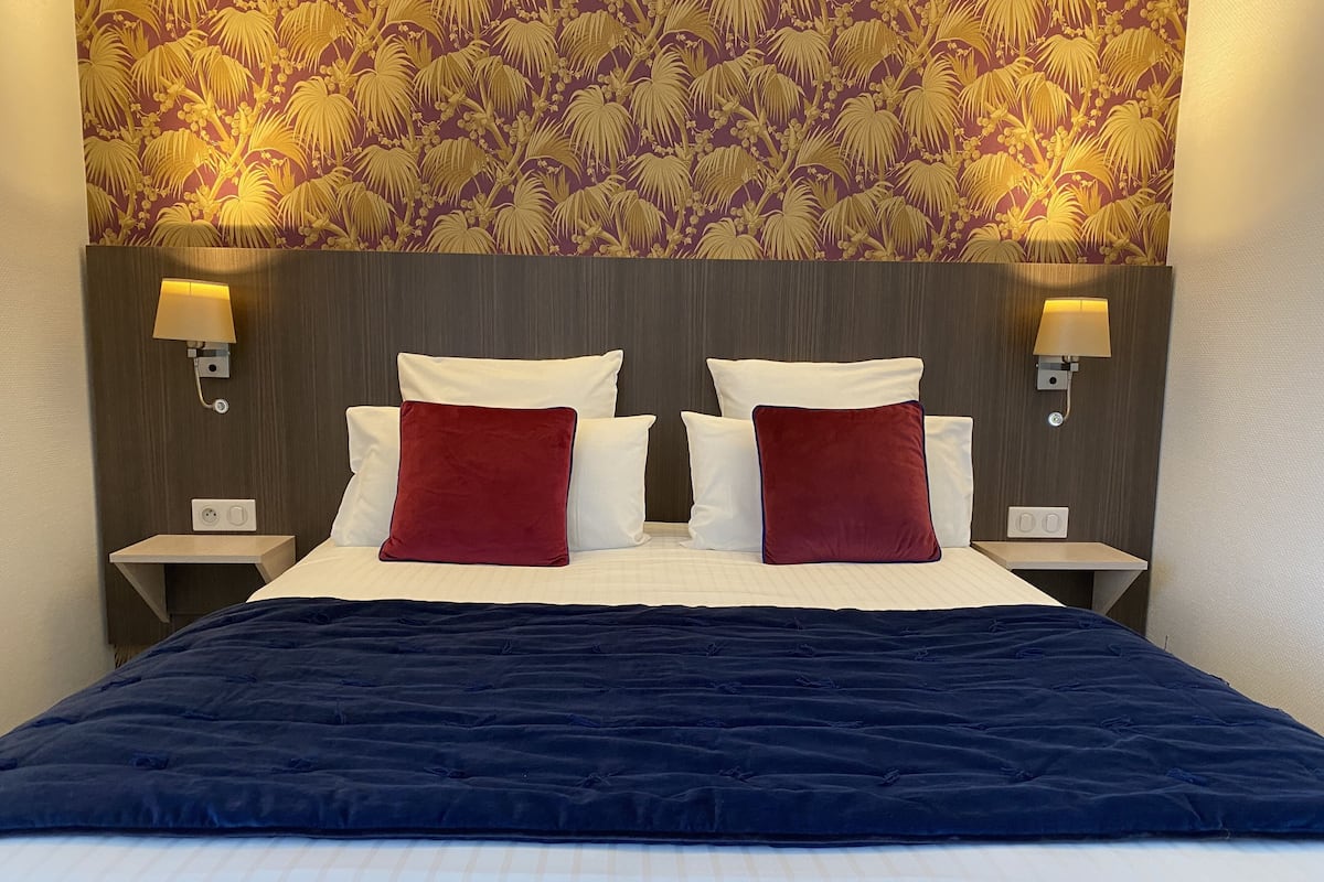 Premium bedding, pillow-top beds, in-room safe, desk
