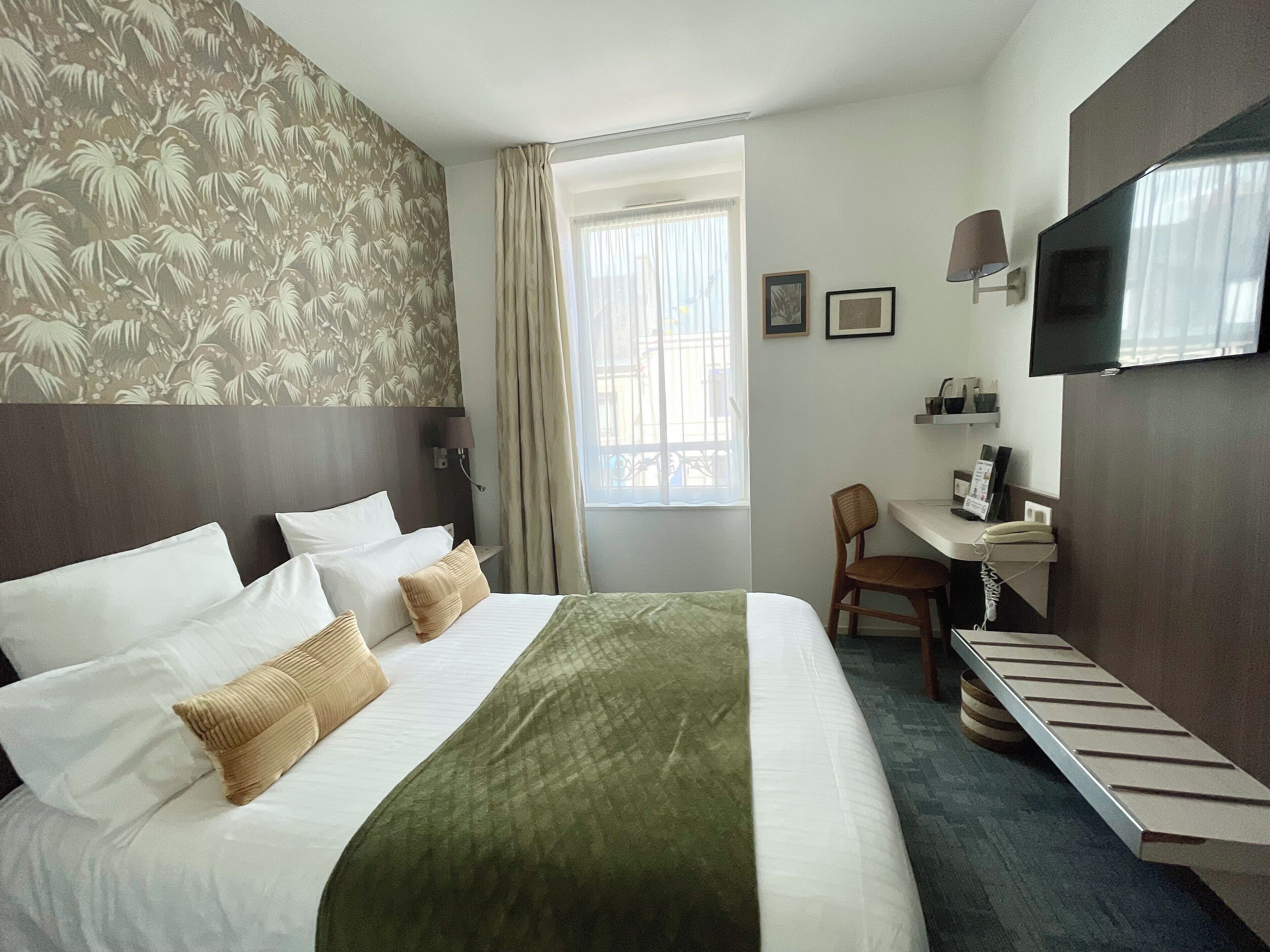 basic double room | premium bedding, pillow-top beds, in-room safe, desk