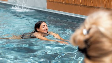 Seasonal outdoor pool, open 11:00 AM to 6:30 PM, pool umbrellas