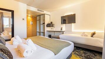 Triple Room | Premium bedding, in-room safe, desk, blackout curtains