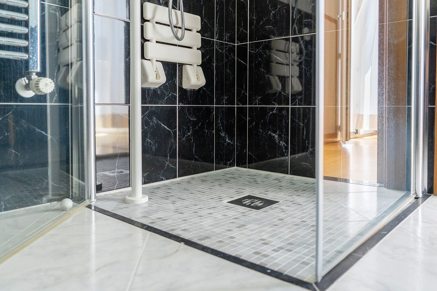 junior suite | bathroom | hair dryer, bidet, towels