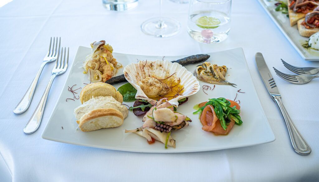 breakfast, lunch, dinner served; beach views