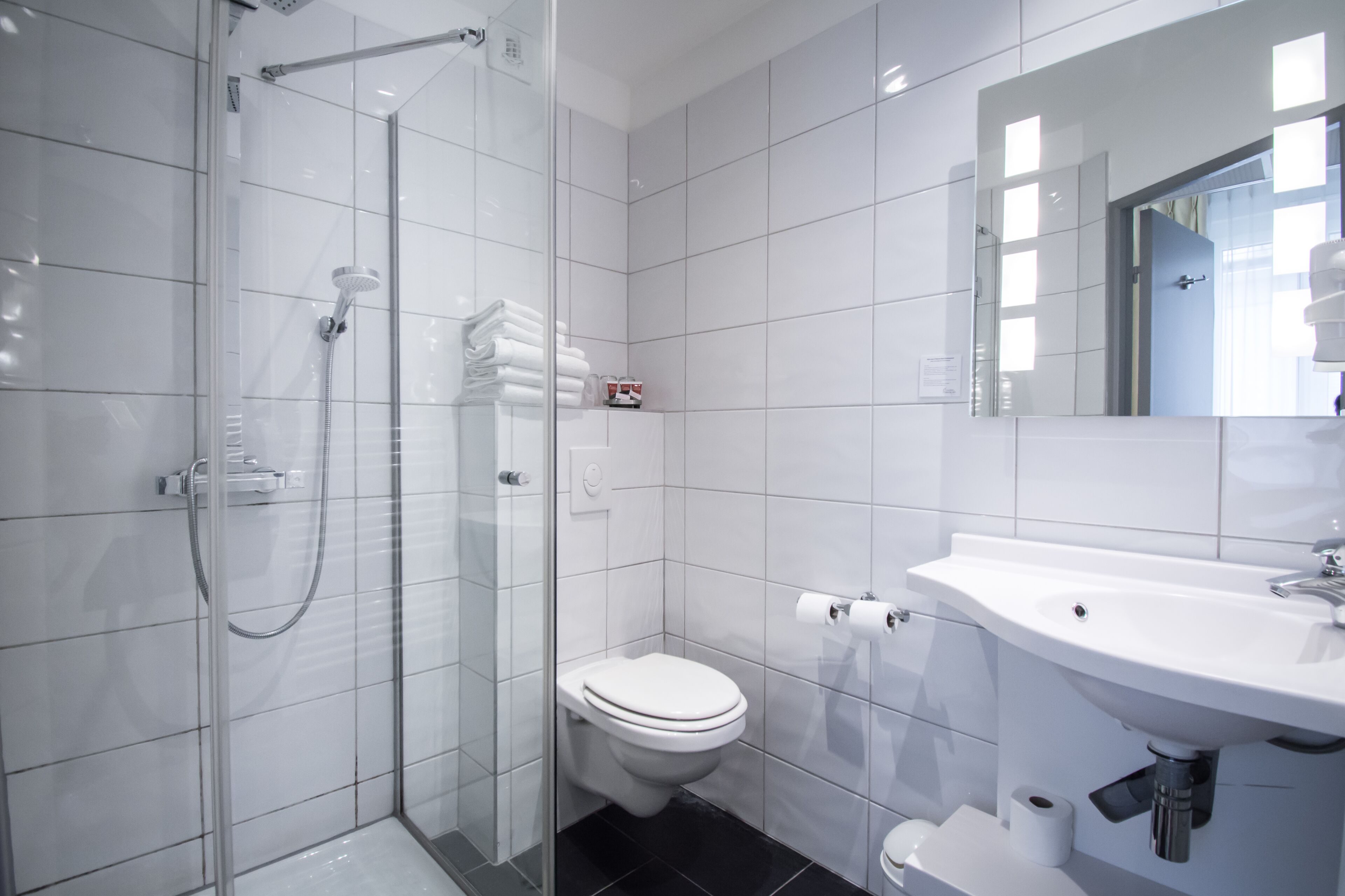 triple room | bathroom | rainfall showerhead, free toiletries, hair dryer, towels