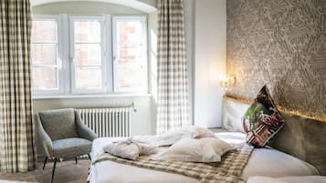 Premium bedding, in-room safe, individually decorated, desk