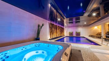 Indoor pool, open 7:00 AM to 10:00 PM, free cabanas, sun loungers
