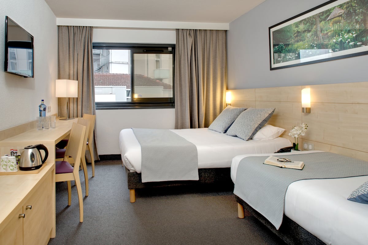 comfort triple room | 1 bedroom, premium bedding, in-room safe, blackout curtains