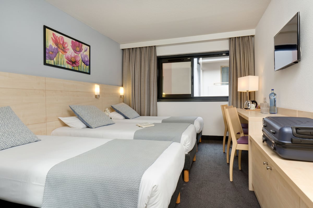 Triple Room | 1 bedroom, premium bedding, in-room safe, blackout curtains