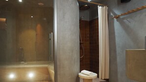 A modern bathroom with a glass-enclosed shower, a marble pedestal sink, and a tiled shower area. - Hôtel Orphée - Orso hotel (Paris)