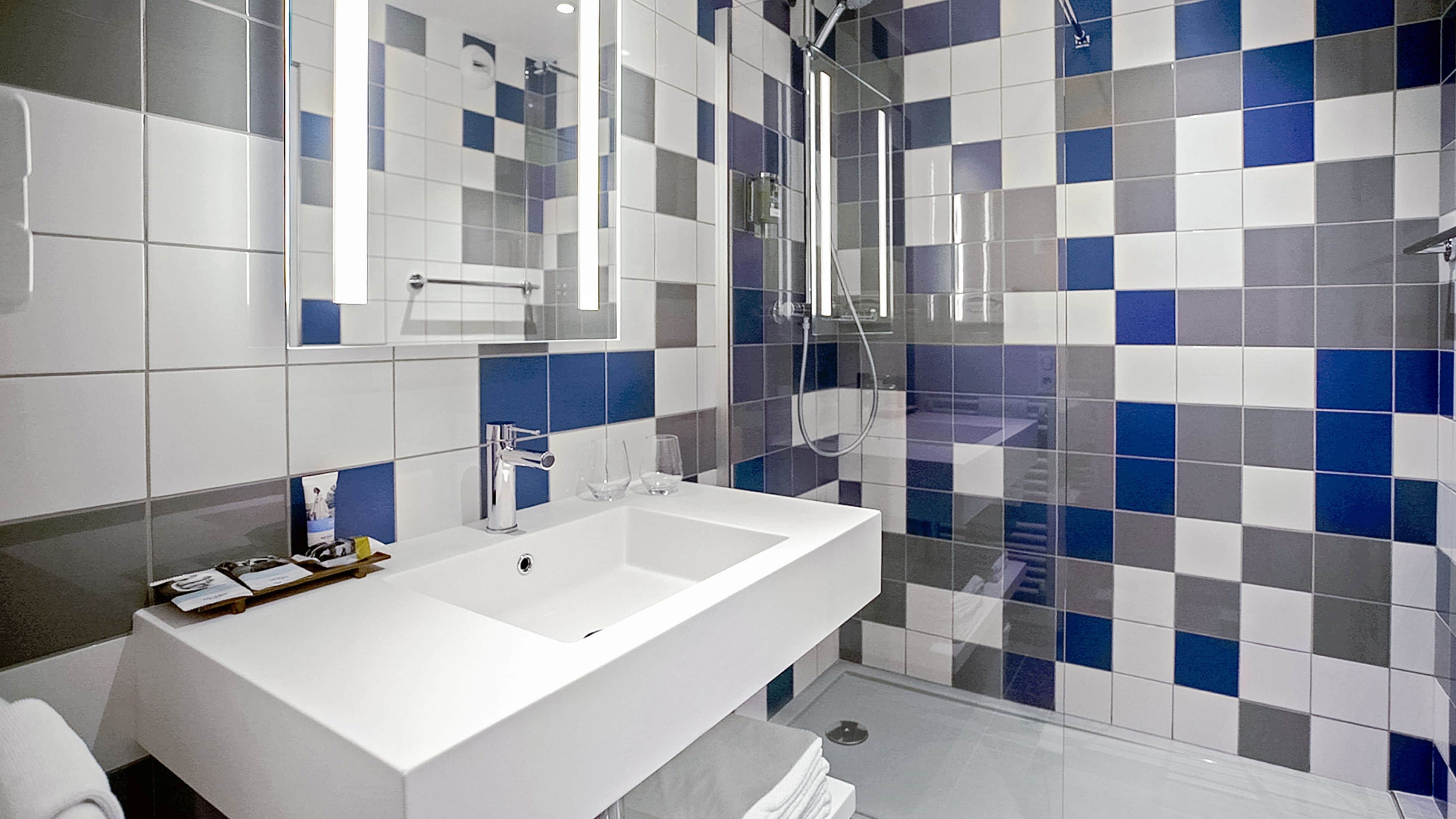 eco-friendly toiletries, hair dryer, towels