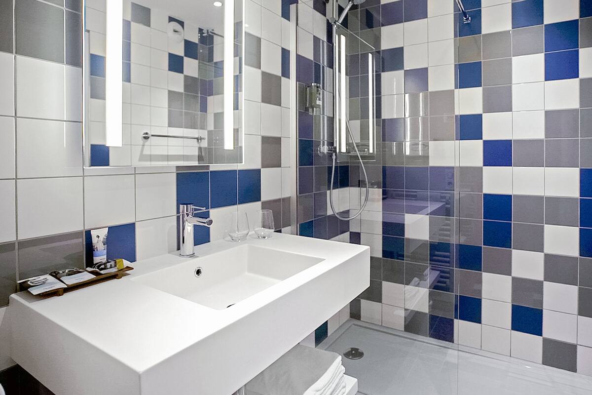 eco-friendly toiletries, hair dryer, towels