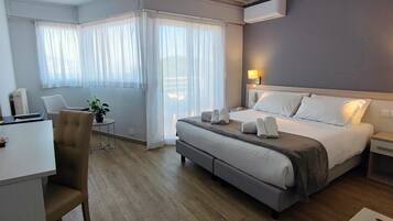 Chambre Supérieure | Minibar, una cassaforte in camera, insonorizzazione, ferro/asse da stiro