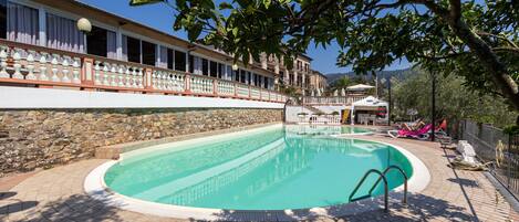 Outdoor pool, pool umbrellas, pool loungers