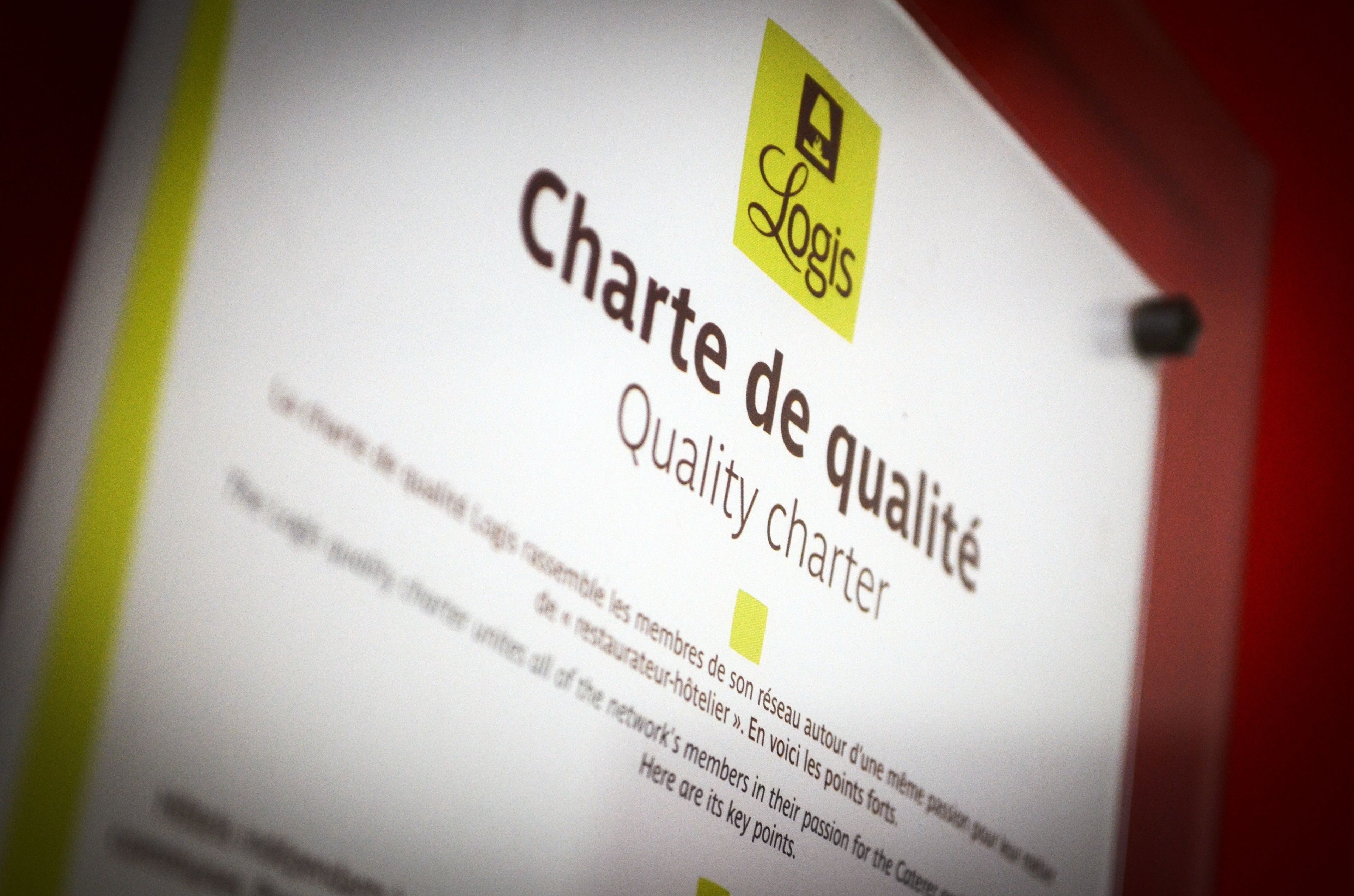Documento titulado 'Charte de qualité' con logotipo y texto en francés, que indica una carta de calidad o norma.