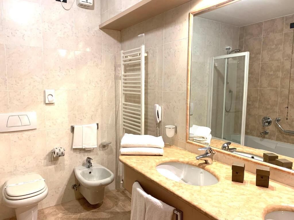 junior suite | minibar, in-room safe, desk, laptop workspace