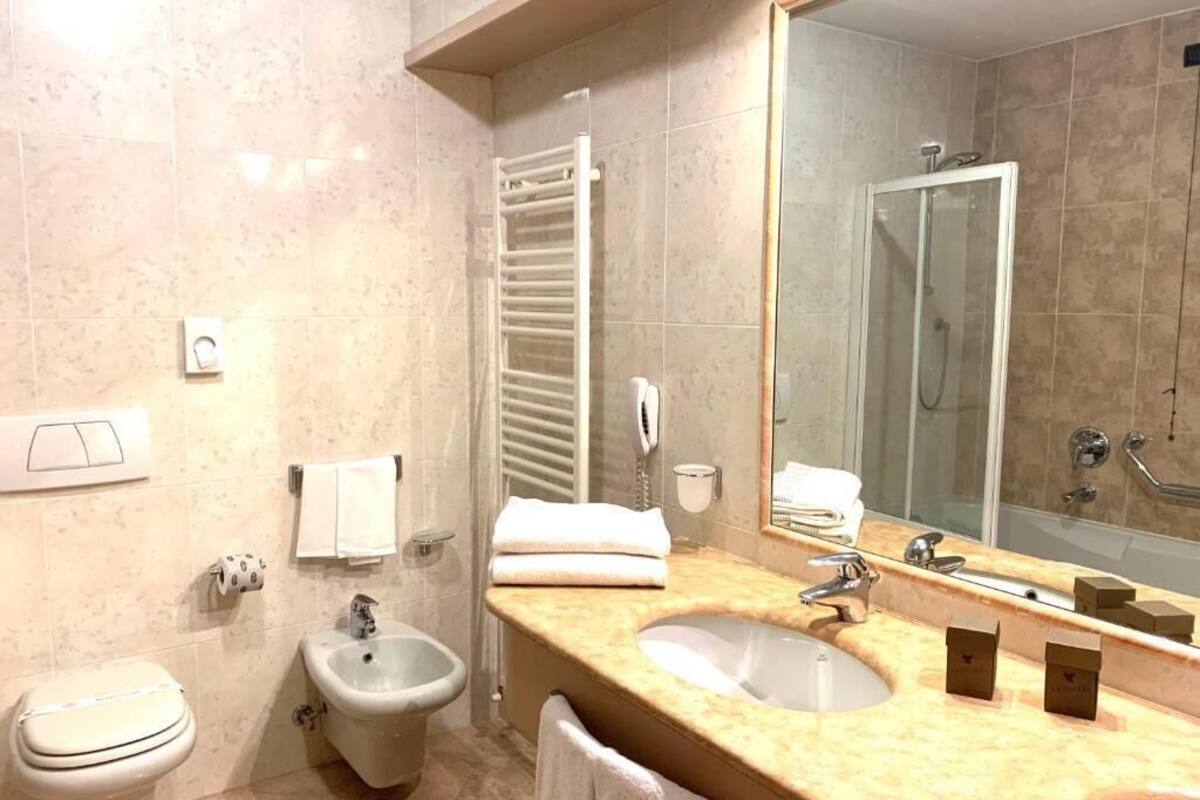 junior suite | minibar, in-room safe, desk, laptop workspace