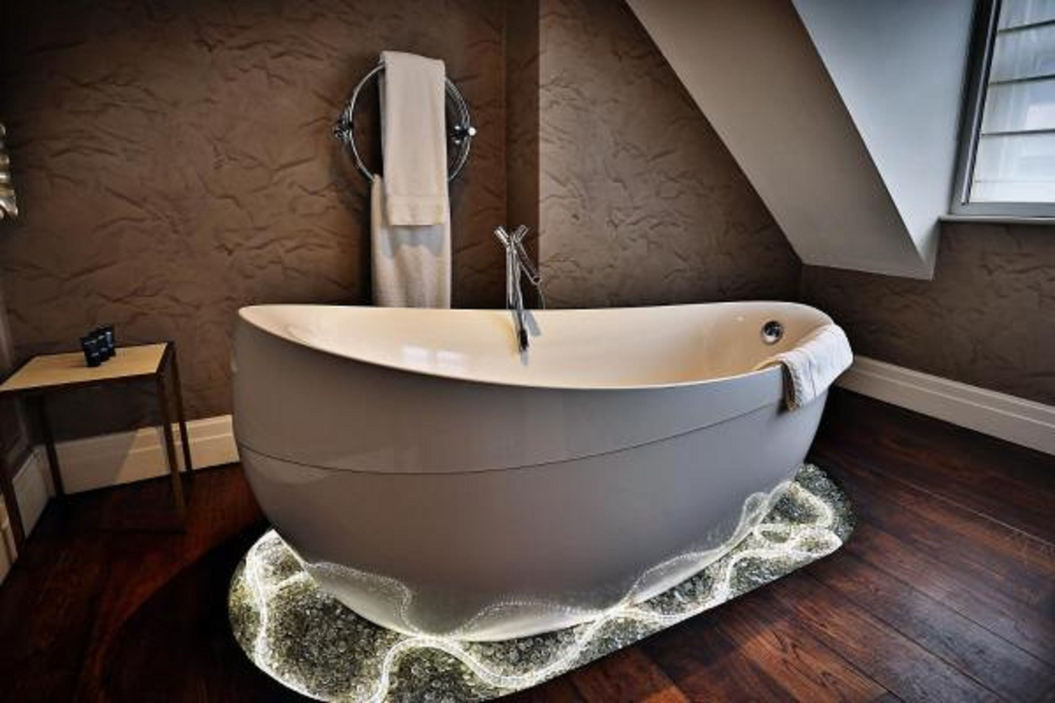 loft suite (super king) | bathroom | combined shower/bathtub, free toiletries, hair dryer, bathrobes