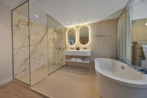 Superior Suite, 1 King Bed | Bathroom | Separate tub and shower, deep soaking tub, hair dryer, towels