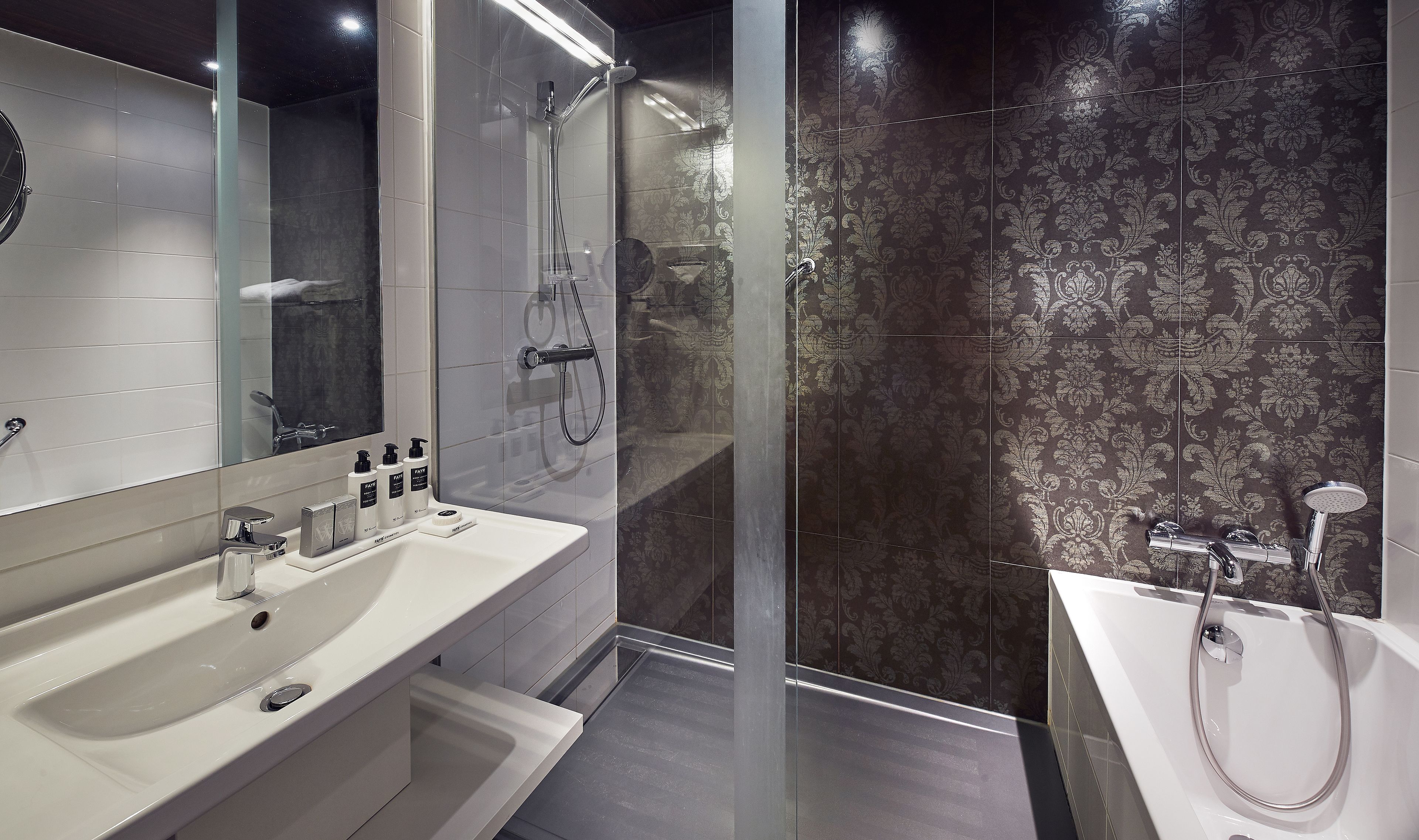 separate bathtub and shower, deep-soaking bathtub, hair dryer, towels