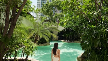 Outdoor pool, open 7:00 AM to 8:00 PM, pool loungers