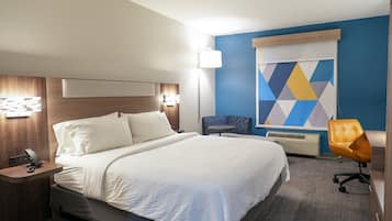 Premium bedding, pillowtop beds, laptop workspace, blackout drapes