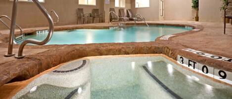 Indoor pool, open 10 AM to 10 PM, pool loungers