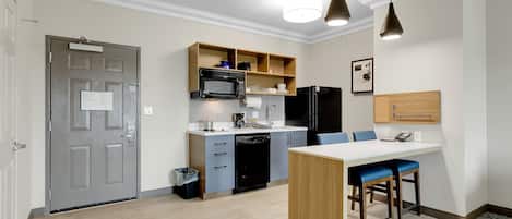 Suite, 1 Bedroom | Private kitchen | Full-sized fridge, microwave, stovetop, dishwasher