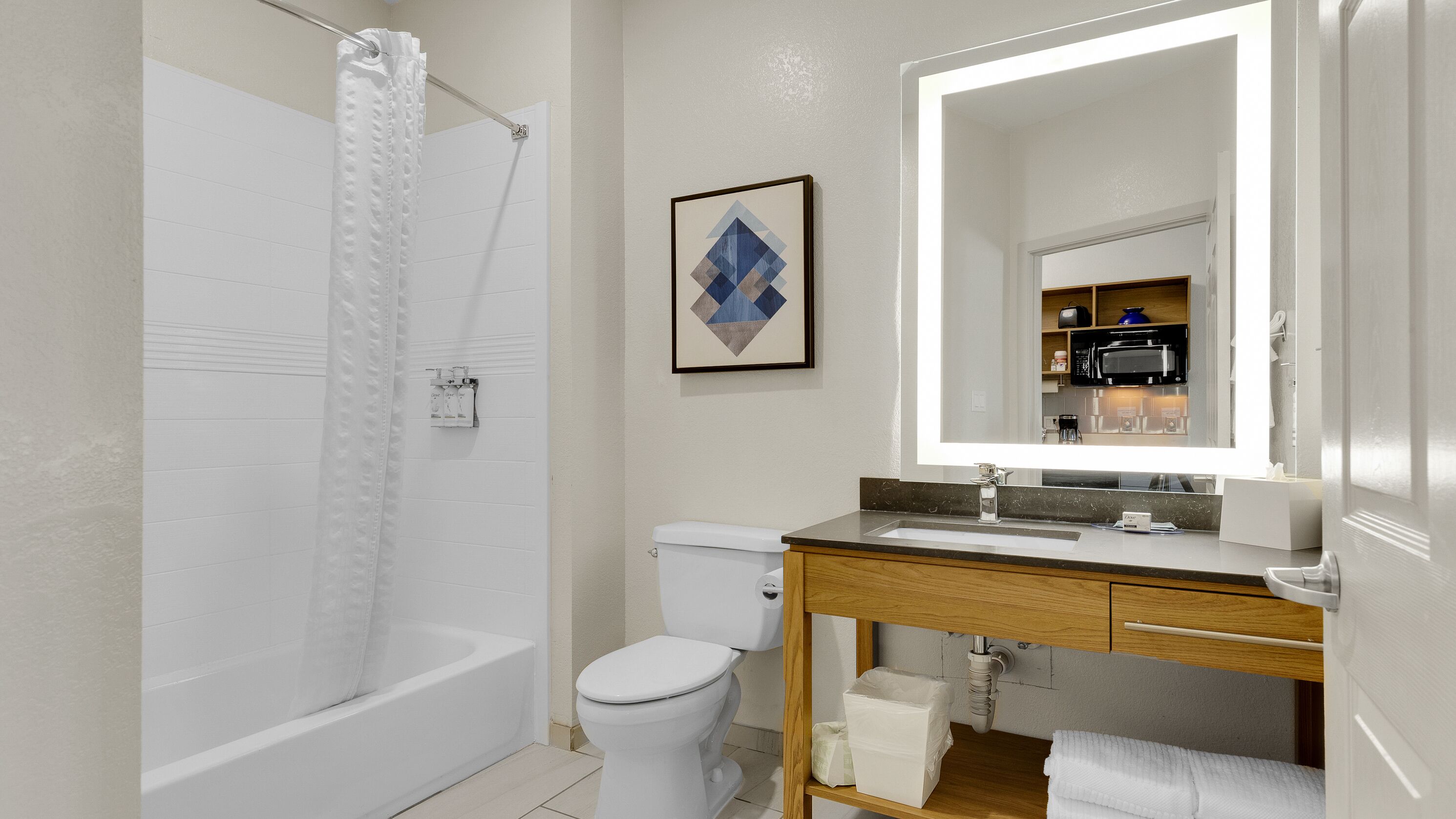 studio suite, 2 queen beds | bathroom | combined shower/bathtub, hair dryer, towels