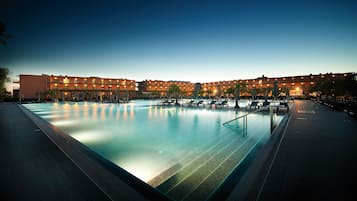 Indoor pool, outdoor pool, pool umbrellas, sun loungers