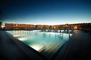 Indoor pool, outdoor pool, pool umbrellas, sun loungers