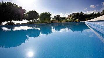 Seasonal outdoor pool, pool umbrellas, sun loungers