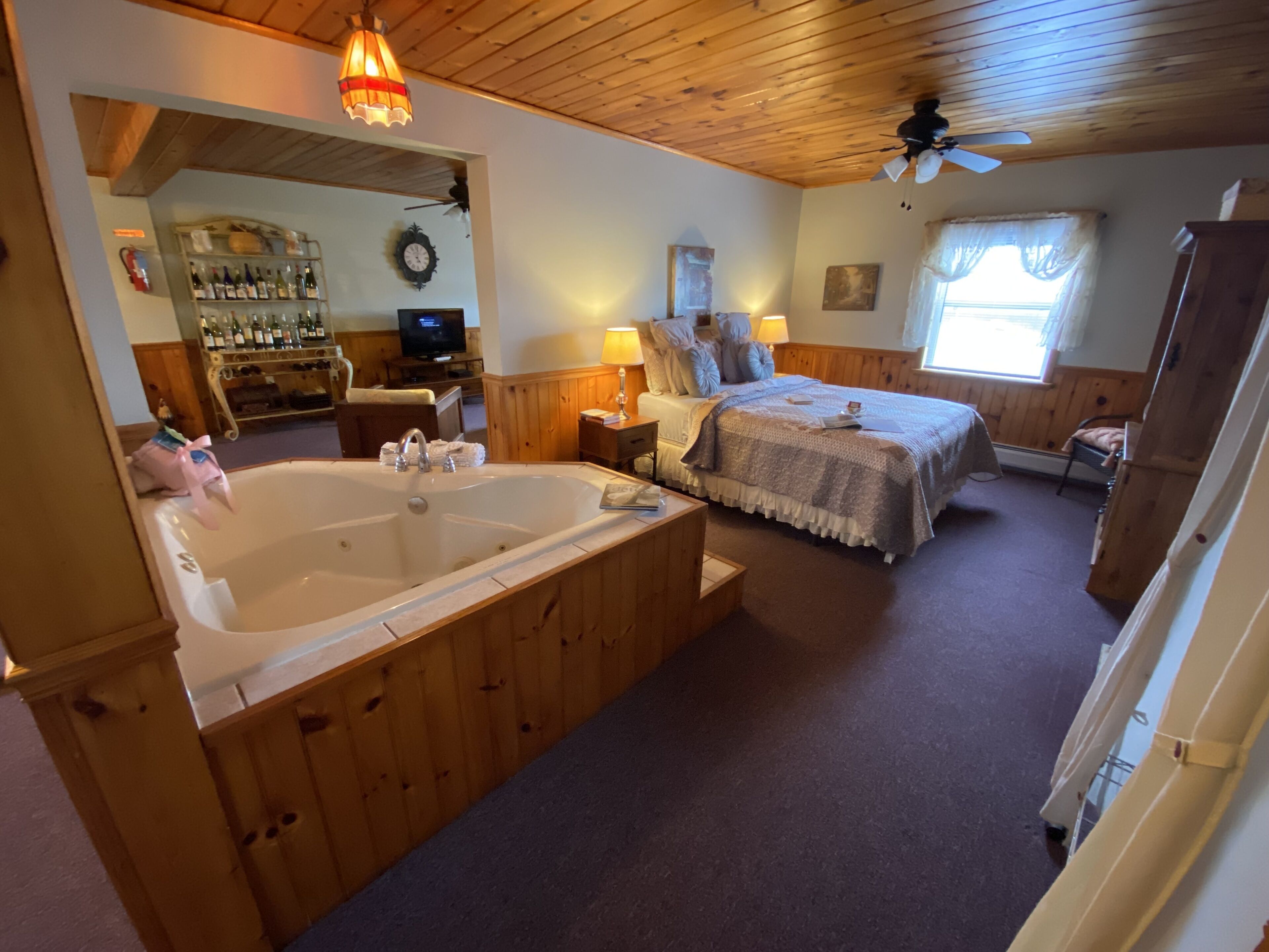 Deluxe Suite, Kitchenette, Lake View | Individually decorated, individually furnished, iron/ironing board