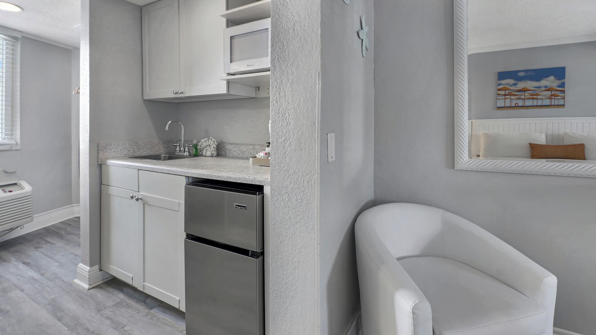 standard condo, multiple beds, kitchenette, pool view | private kitchenette | mini-fridge, microwave, coffee/tea maker, toaster