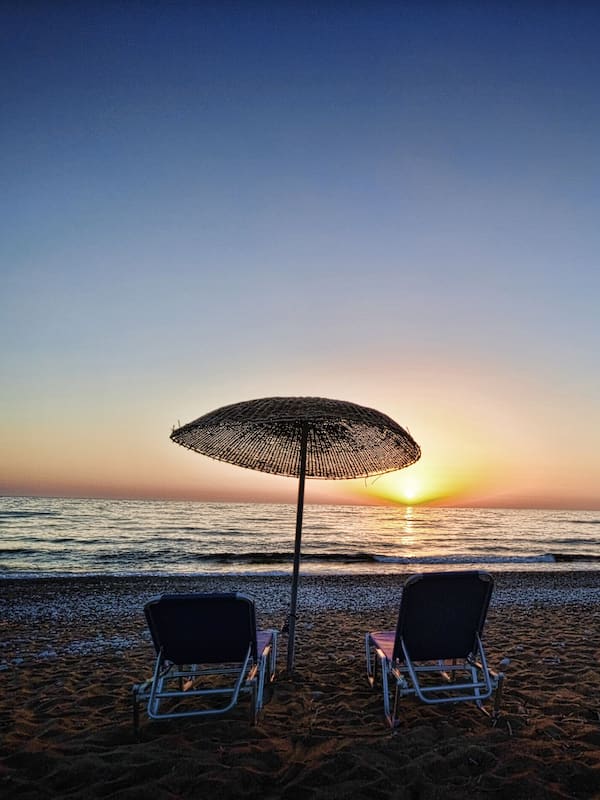 On the beach, sun loungers, beach umbrellas, snorkeling