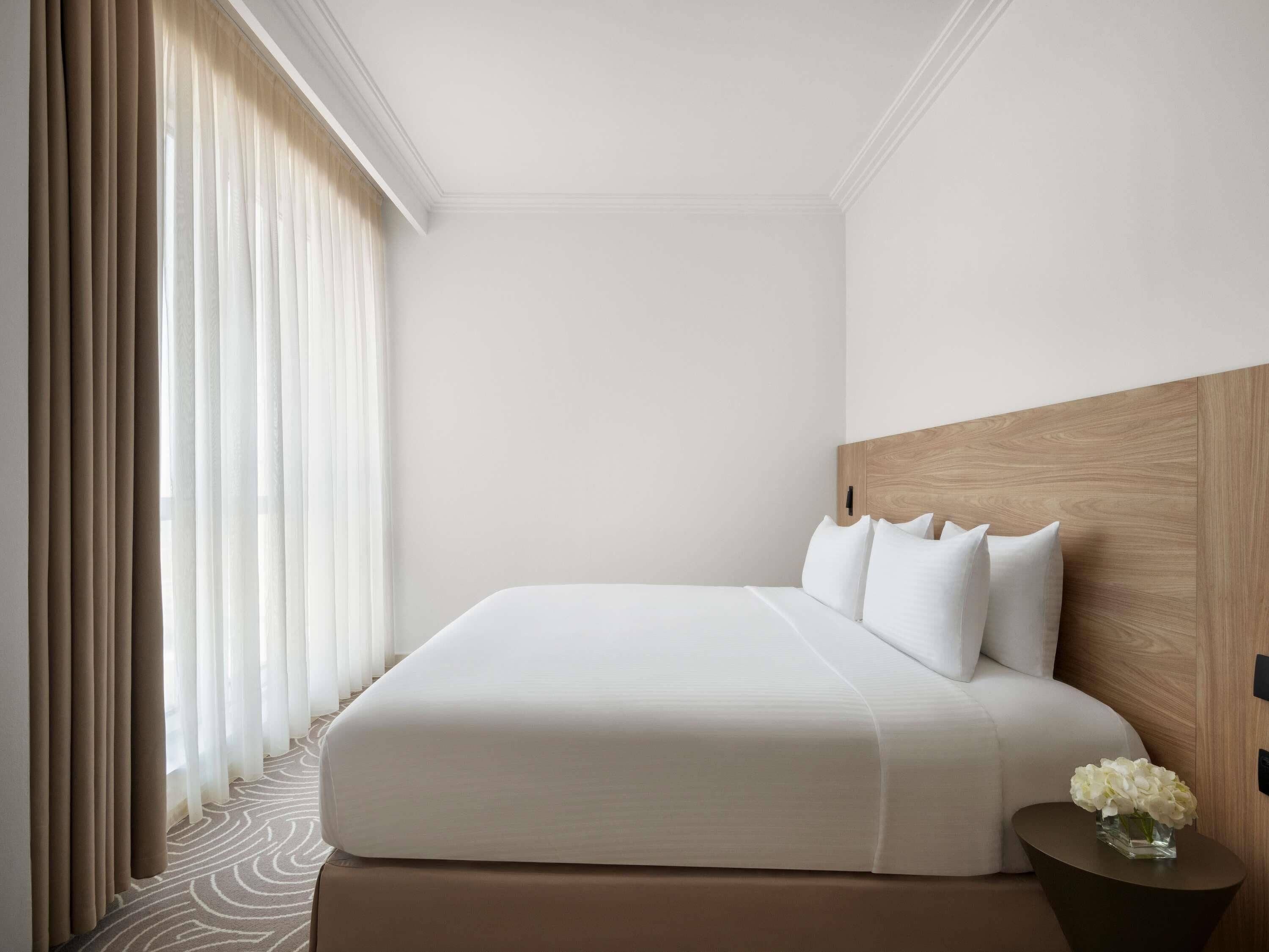 Roba de llit d'alta qualitat, minibar i caixa forta a l'habitació 