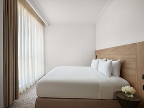 Roba de llit d'alta qualitat, minibar i caixa forta a l'habitació 