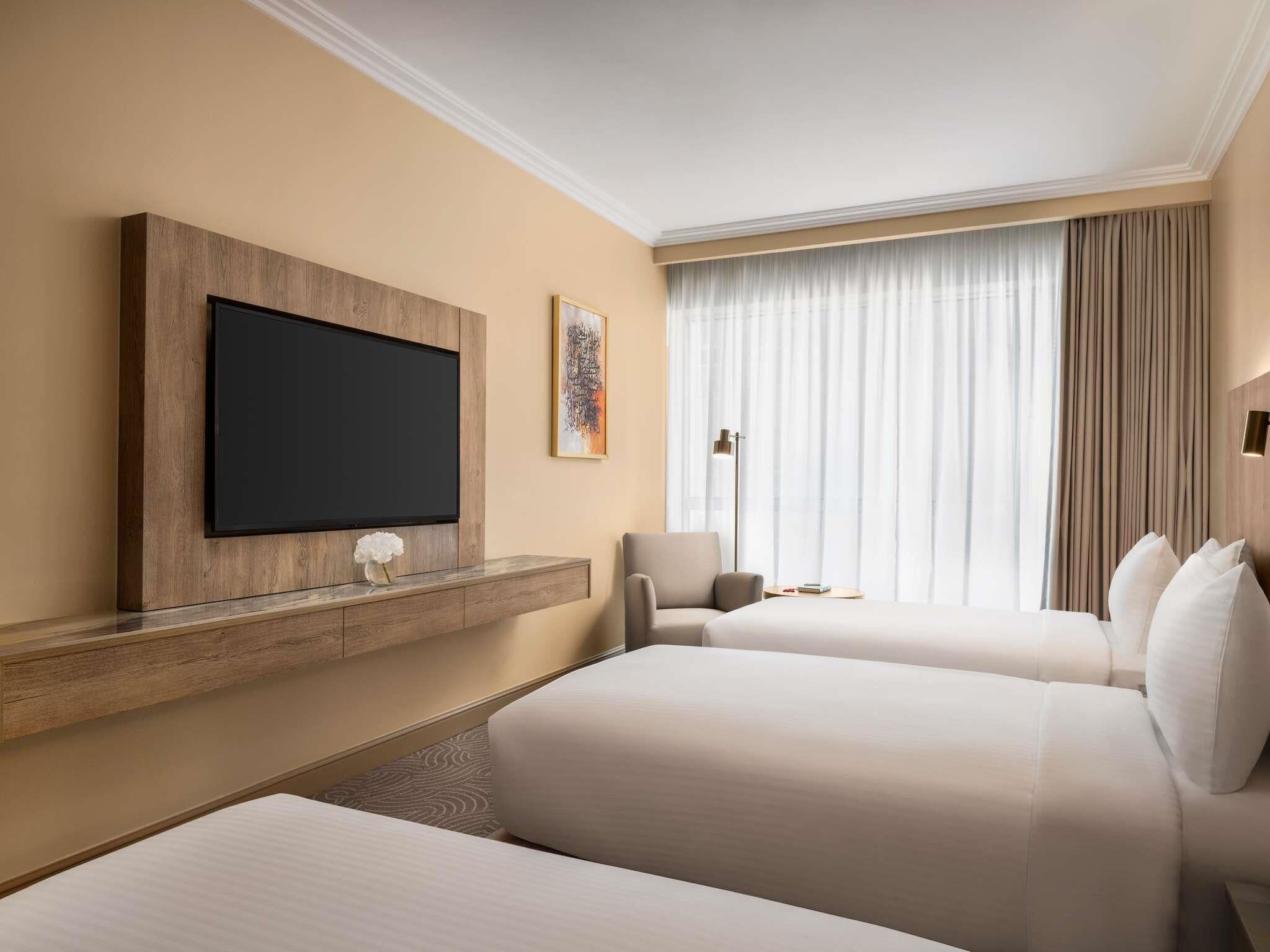 Habitación superior, vistas a la ciudad (4 Single Beds) | Sábanas de algodón egipcio y ropa de cama de alta calidad