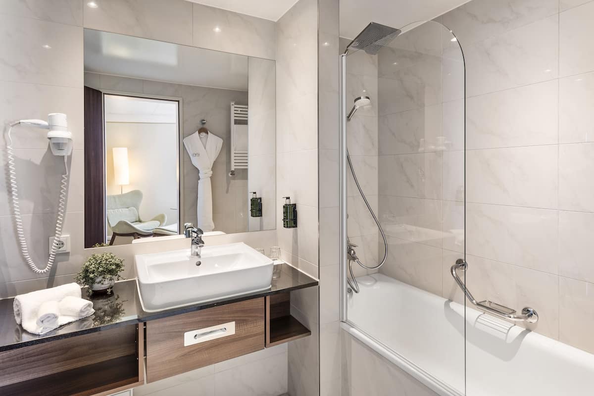 shower, designer toiletries, hair dryer, bathrobes