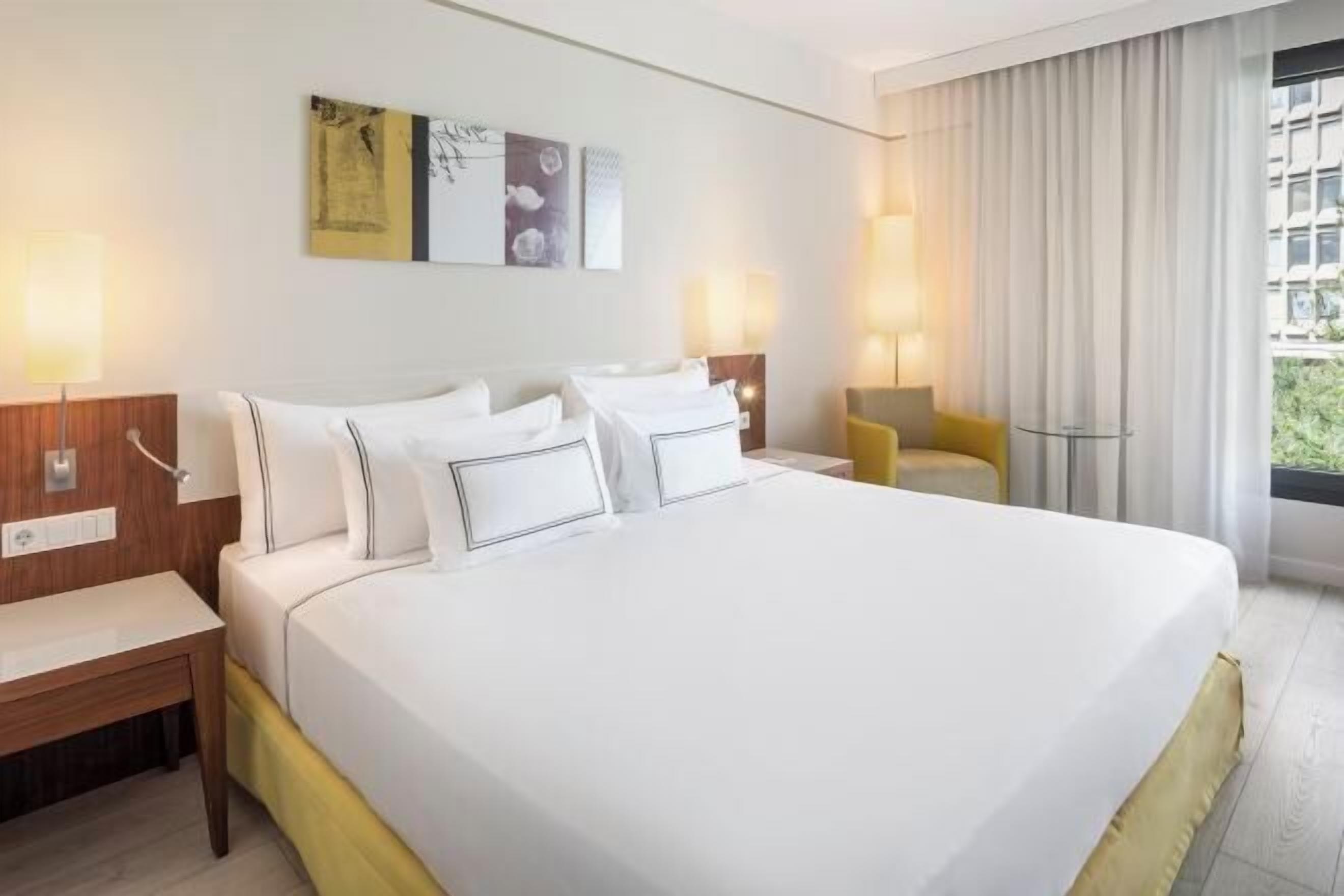 Ropa de cama hipoalergénica y minibar 