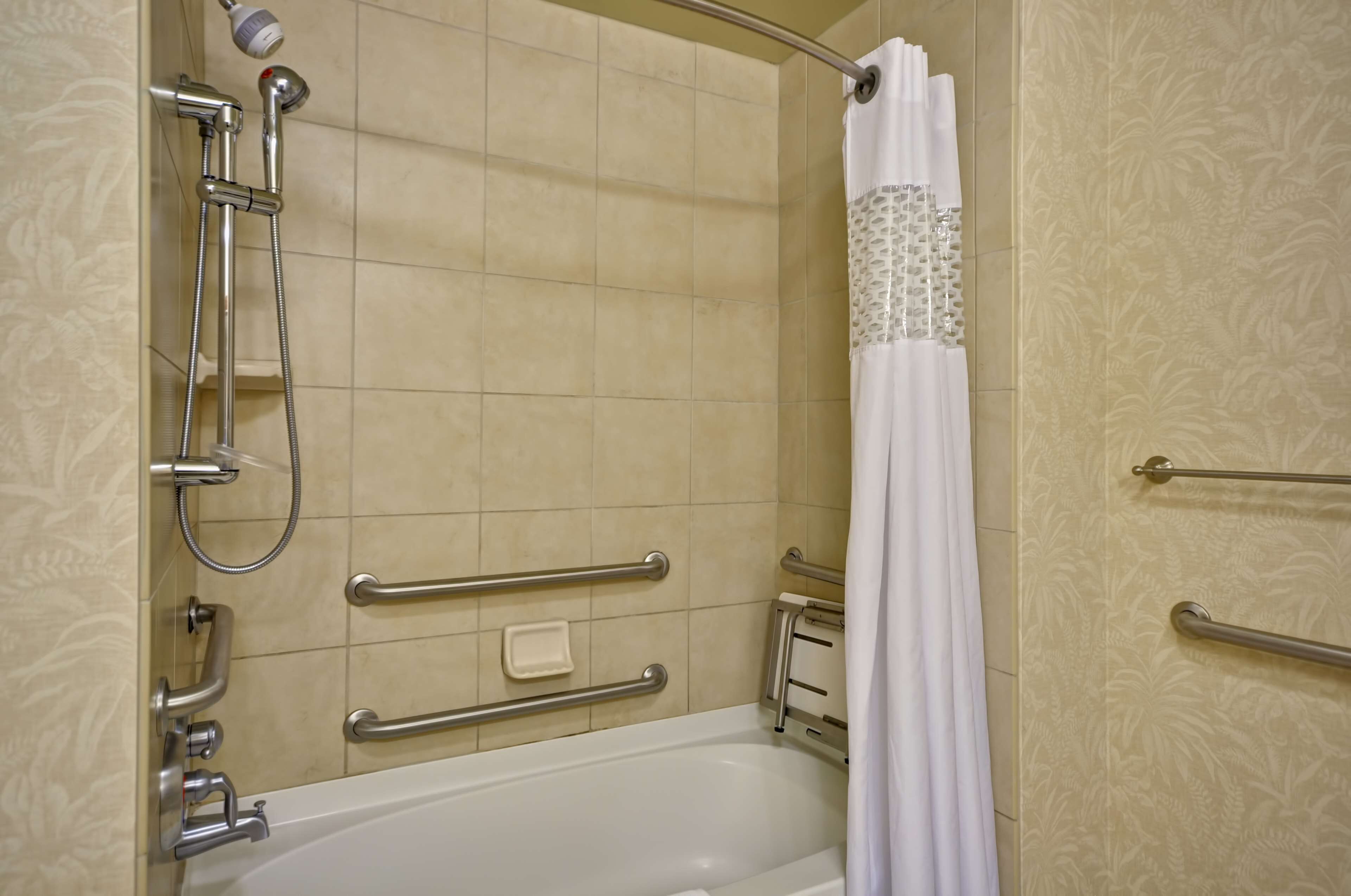 combined shower/bathtub, free toiletries, hair dryer, towels