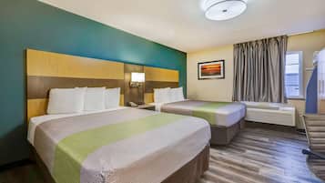 Desk, laptop workspace, blackout drapes, iron/ironing board