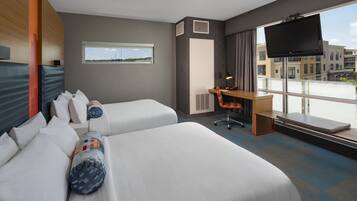 Hypo-allergenic bedding, pillow-top beds, in-room safe, desk