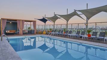 Outdoor pool, cabanas (surcharge), sun loungers