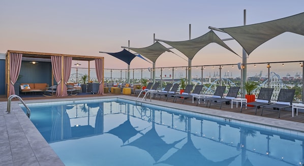 Outdoor pool, pool cabanas (surcharge), pool loungers