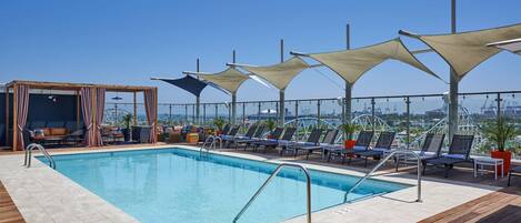 Outdoor pool, pool cabanas (surcharge), pool loungers