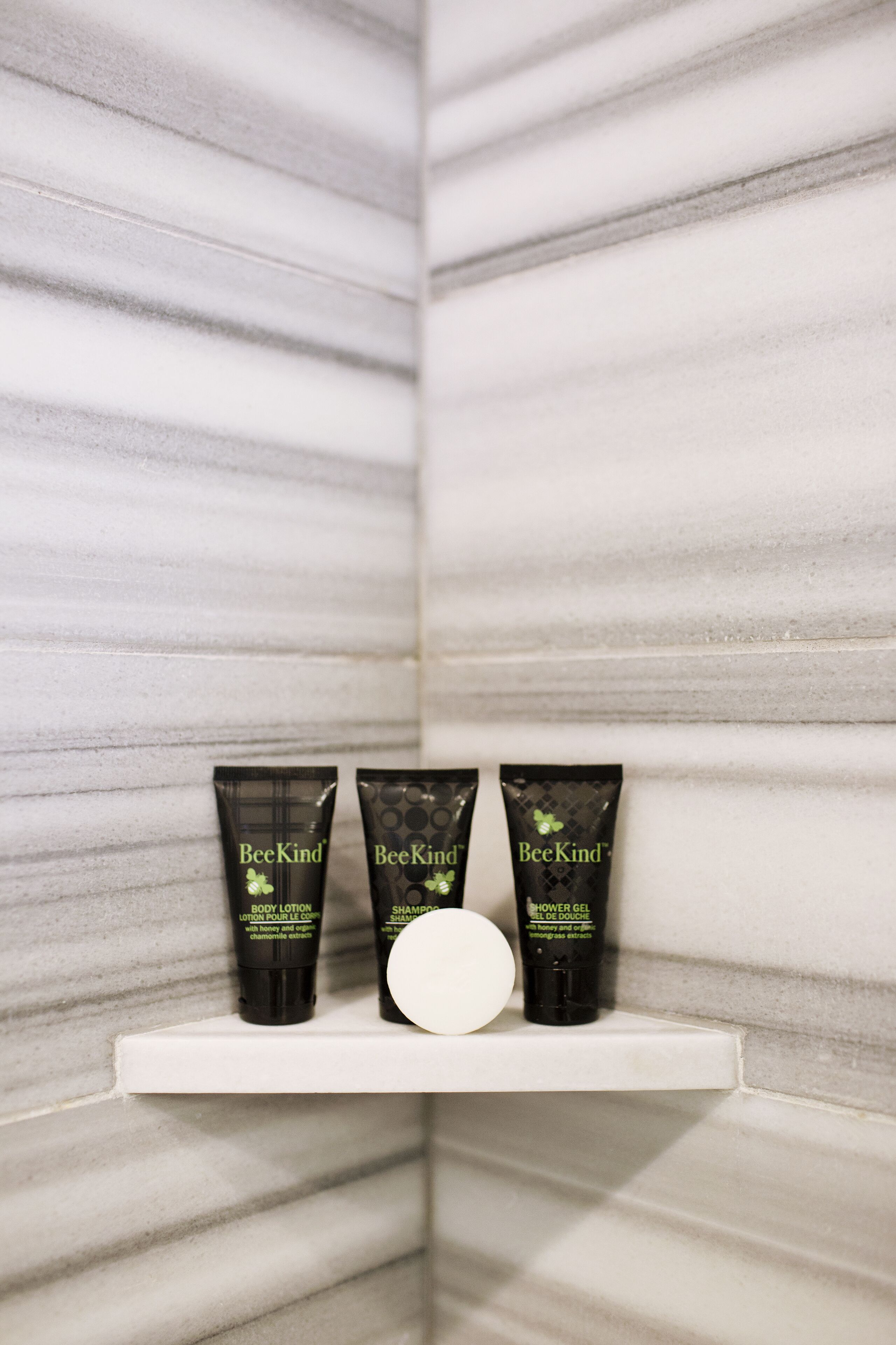 designer toiletries, hair dryer, bathrobes, towels