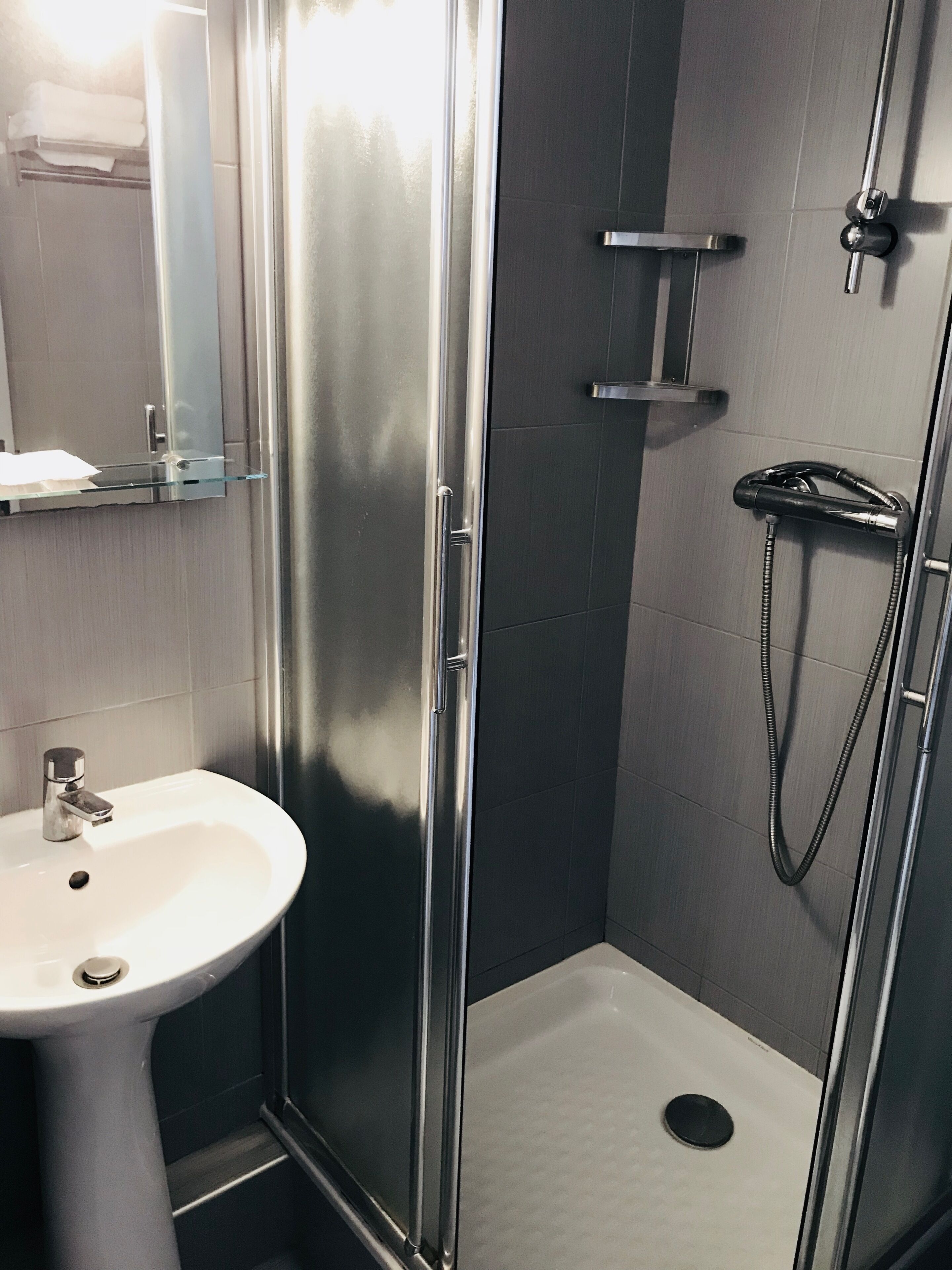 double room, city view | bathroom | rainfall showerhead, hair dryer, towels