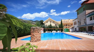 Seasonal outdoor pool, sun loungers