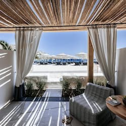 Deluxe Room, 1 King Bed, Beachfront | Premium bedding, down comforters, free minibar items, in-room safe